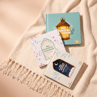 Les 3 tomes en flat-lay